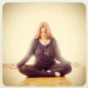 woman meditating with knees crossed